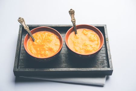 Aloo Paratha / Indian Potato stuffed Flatbread. Served with fresh curd and tomato ketchup. selective focusの写真素材