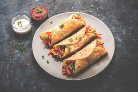 Carrot Pickle / Gajar ka Achar or Loncha in hindi. Served in a bowl over moody background. Selective focusの写真素材