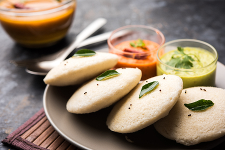 Idly sambar or Idli with Sambhar and green, red chutney. Popular South indian breakfastの写真素材