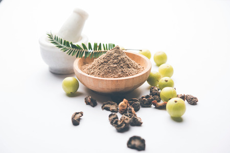 Amla powder with raw Avla, it's an Ayurvedic alternative medicineの写真素材
