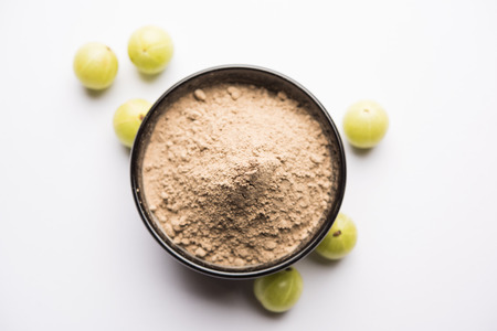 Amla powder with raw Avla, it's an Ayurvedic alternative medicineの写真素材