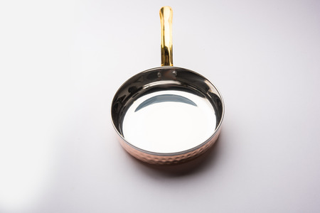 Copper Tarka/Tadka Fry pan with handle also can be used as a stylish serving bowlの写真素材