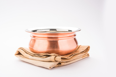 Empty Copper bowl or Handi over white backgroundの写真素材