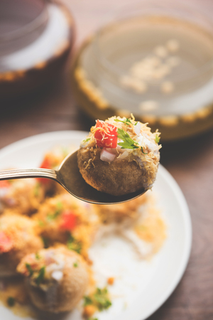 Dahi Puri chat is an indian road side snack item which is especially popular in the state of Maharashtra, Indiaの写真素材