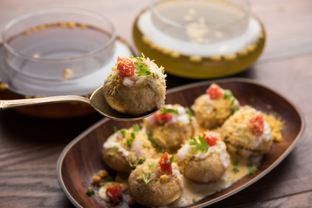 Dahi Puri chat is an indian road side snack item which is especially popular in the state of Maharashtra, Indiaの写真素材