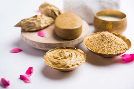 Herbal or Ayurvedic face Pack using Multani mitti, milk etc placed with Soap, towel. Selective focusの写真素材