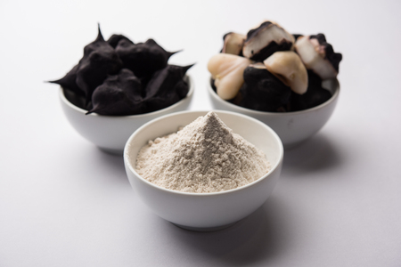 cooked Water chestnut with flour or powder, also known as singada/singara or shingada peeth, selective focusの写真素材