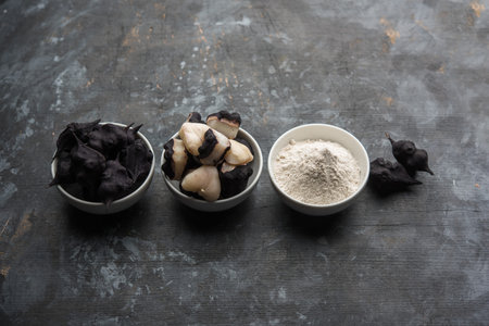 cooked Water chestnut with flour or powder, also known as singada/singara or shingada peeth,...