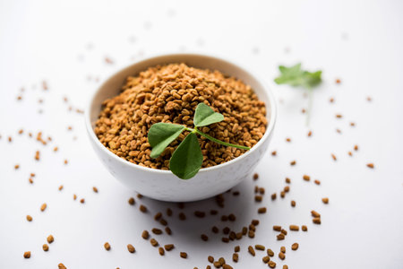 Fenugreek Seeds or Methi Dana served in a bowl, selective focus