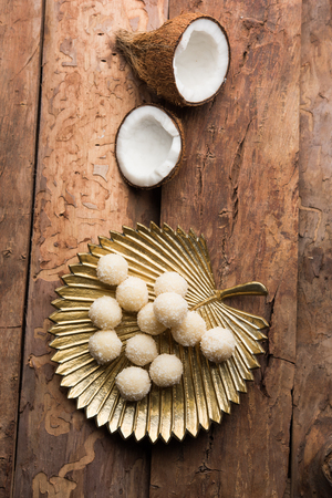 Coconut Sweet Laddoo OR Nariyal Ladduis a Popular Festival food from India. Served over moody background, selective focusの写真素材