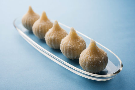 Sweet Modak made using coconut, khoya and sugar. Popular Maharashtrian recipe offered to lord...