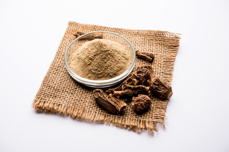 Hemidesmus indicus also known as Ananthamoola or Naruneendi or Nannari in dried steam and powder form. It's a useful Ayurvedic medicine from Indiaの写真素材