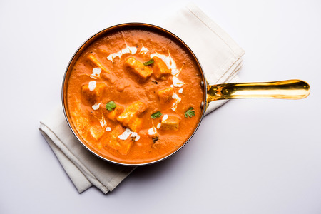Paneer Butter Masala or Cheese Cottage Curry in serving a bowl or pan, served with or without roti and riceの写真素材