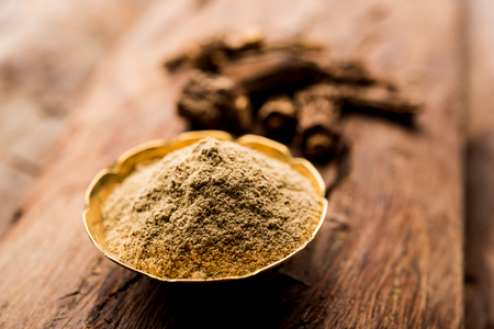 Hemidesmus indicus also known as Ananthamoola or Naruneendi or Nannari in dried steam and powder form. It's a useful Ayurvedic medicine from Indiaの写真素材