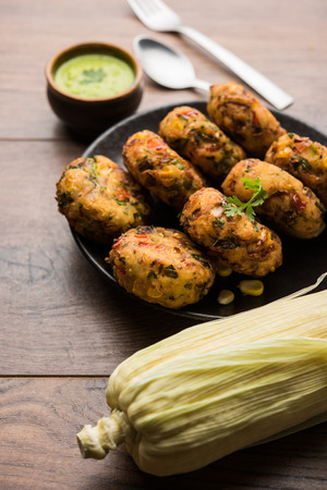 Crispy Corn Tikki, pakora/pakoda or pattice also known as cutlet. served with green chutney. Selective focusの写真素材