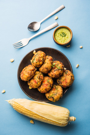 Crispy Corn Tikki, pakora/pakoda or pattice also known as cutlet. served with green chutney. Selective focusの写真素材