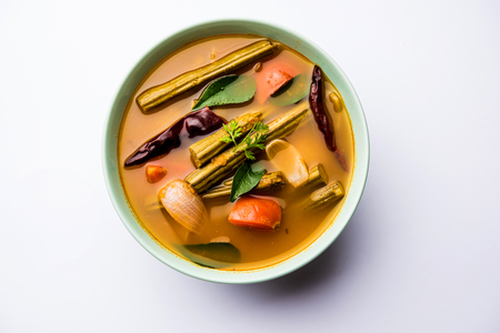 Drumstick Curry or Shevga sheng bhaji or south indian Sambar, served in a bowl over moody background. Selective focusの写真素材