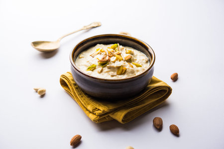 Sweet Rabdi or Lachha Rabri or basundi, made with pure milk garnished with dry fruits. Served in a...
