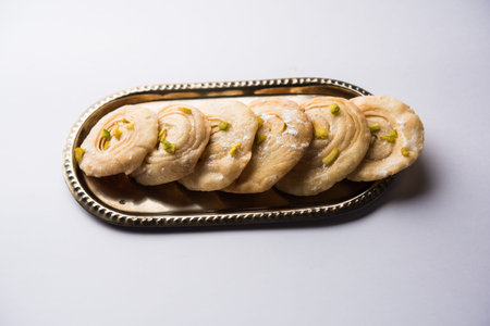 Chirote or Chiroti is a sweet dish from Karnataka and Maharashtra. Served in a plate as a dessert on...