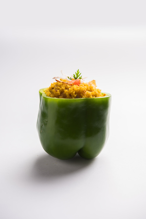 Stuffed capsicum or bharwa shimla mirchi is a popular Indian main course recipe.の写真素材