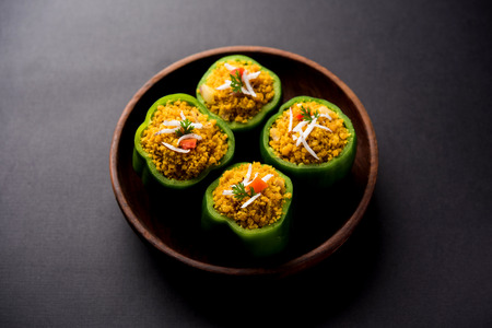 Stuffed capsicum or bharwa shimla mirchi is a popular Indian main course recipe.の写真素材