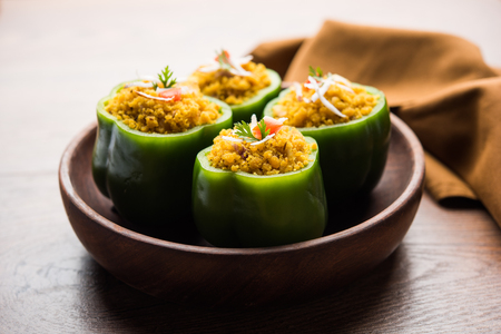 Stuffed capsicum or bharwa shimla mirchi is a popular Indian main course recipe.の写真素材