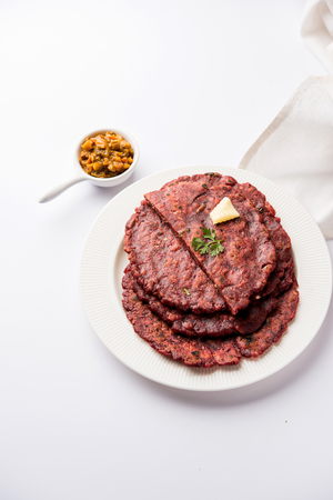 Ragi Roti made from finger millet from India is extremely rich in proteins served with pickle or achar. selective focusの写真素材