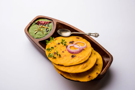Makki di roti with sarson ka saag, popular punjabi main course recipe in winters made using corn...
