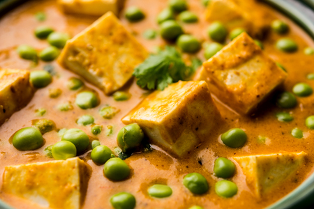 Green peas or matar paneer curry recipe, served in a bowl. selective focusの写真素材