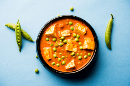 Green peas or matar paneer curry recipe, served in a bowl. selective focusの写真素材