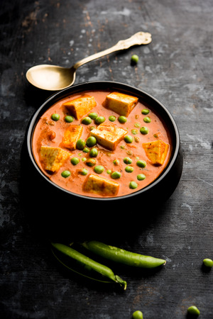 Green peas or matar paneer curry recipe, served in a bowl. selective focusの写真素材
