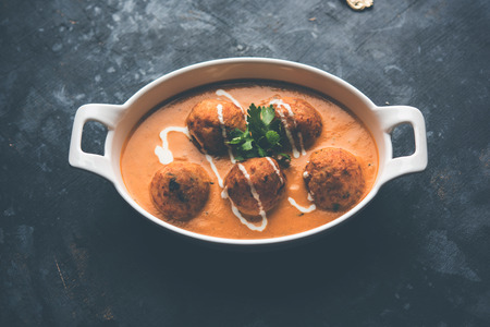 Malai Kofta Curry is a Mughlai special recipe served in a bowl. Selective focusの写真素材