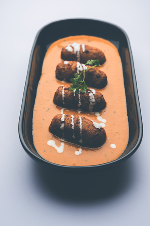 Malai Kofta Curry is a Mughlai special recipe served in a bowl. Selective focusの写真素材