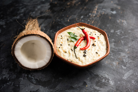 Nariyal or Coconut Chutney served in a bowl. Isolated over moody background. selective focusの写真素材