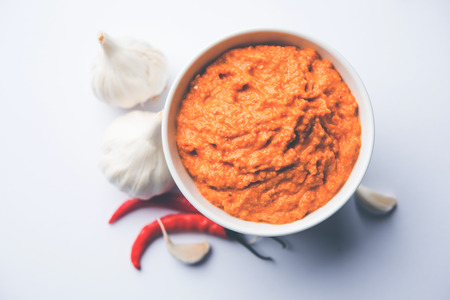 Garlic chutney, made using lahsun/lehsun originating from the India, served in a bowl over moody background. selective focusの写真素材