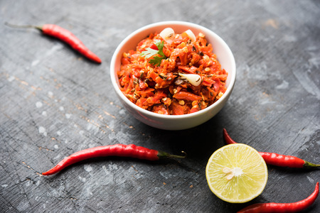 Hot and spicy Hot chilli chutney using lal mirch, cumin seeds, lemon juice and coriander. served in a bowl. selective focusの写真素材