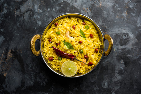 Lemon Rice is a South Indian turmeric rice or maharashtrian recipe called fodnicha bhat using...