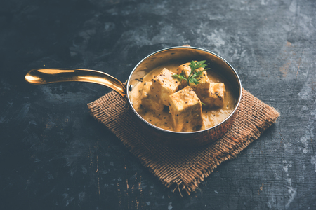 Malai or achari Paneer in a gravy made using Whipping Cream. served on a serving pan. selective focusの写真素材