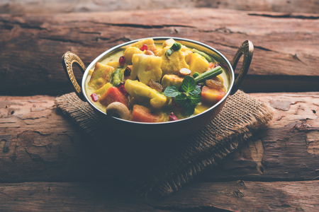 Navratan Korma is a rich, creamy and flavorful Mughlai dish  from India that literally translates to nine-gem curry. The âgemsâ are the fruits, vegetables and nuts that make up the curry.の写真素材
