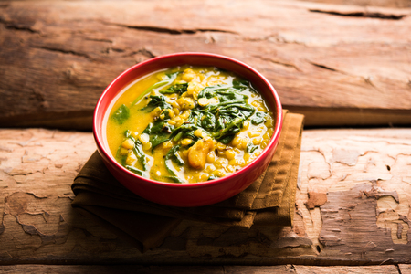 Dal Palak or Lentil spinach curry - popular Indian main course healthy recipe. served in a karahi/pan or bowl. selective focusの写真素材