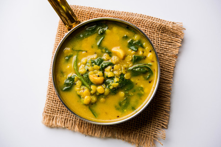 Dal Palak or Lentil spinach curry - popular Indian main course healthy recipe. served in a karahi/pan or bowl. selective focusの写真素材