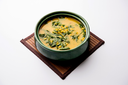Dal Palak or Lentil spinach curry - popular Indian main course healthy recipe. served in a karahi/pan or bowl. selective focusの写真素材