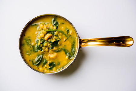 Dal Palak or Lentil spinach curry - popular Indian main course healthy recipe. served in a karahi/pan or bowl. selective focusの写真素材