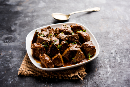 Mutton Liver fry or Kaleji masala, popular Non vegetarian recipe from India and Pakistan. served dry or with curry in a bowl, karahi or plateの写真素材