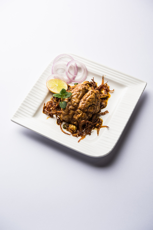 Brain / Bheja Fry of goat, sheep or lamb is a popular Indian or pakistani dish cooked on Bakra Eid(Eid-ul-zuha). served in karahi, pan or plate. selective focusの写真素材