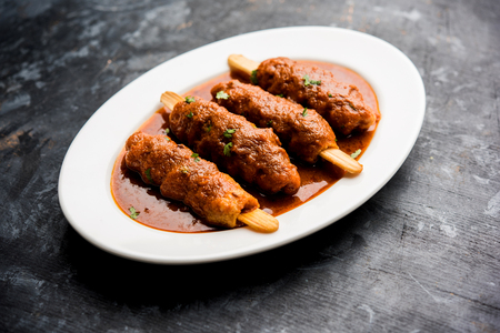 Baingan masala / Eggplant / brinjal curry served in bowl or pan, selective focusの写真素材