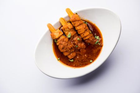 Baingan masala / Eggplant / brinjal curry served with chapati and rice, selective focusの写真素材