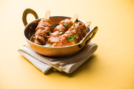 Baingan masala / Eggplant / brinjal curry served in bowl or pan, selective focusの写真素材