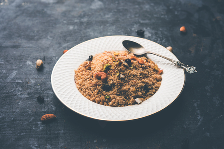 Semolina Halwa / Sooji ka Halva or sweet Rava Sheera or shira - Indian festival sweet made of semolina, nuts and Gheeの写真素材
