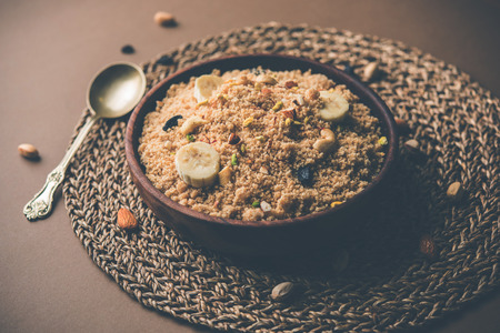 Semolina Halwa / Sooji ka Halva or sweet Rava Sheera or shira - Indian festival sweet made of semolina, nuts and Gheeの写真素材